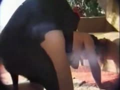 Black dog shoving inside woman s slit